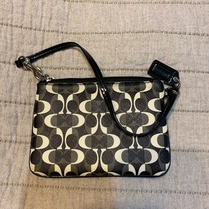 Black and white coach wristlet